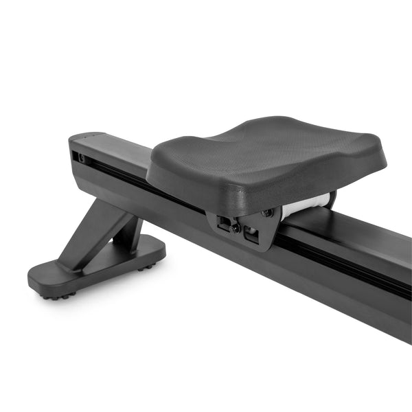 Black SMAI AirMag X rower seat mounted on a sliding rail with a base support.