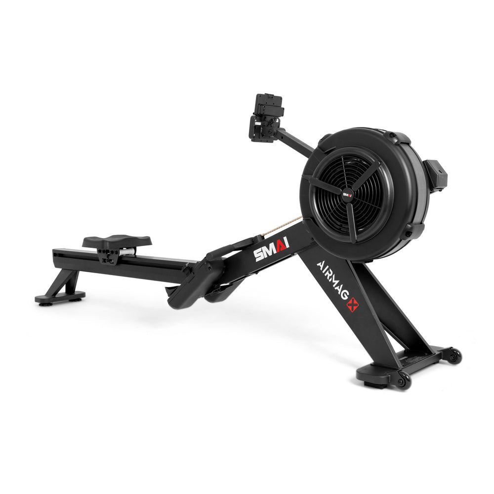 Black SMAI AirMag X rower with a flywheel, sliding seat, and a device holder on a white background, featuring hybrid air magnetic resistance.