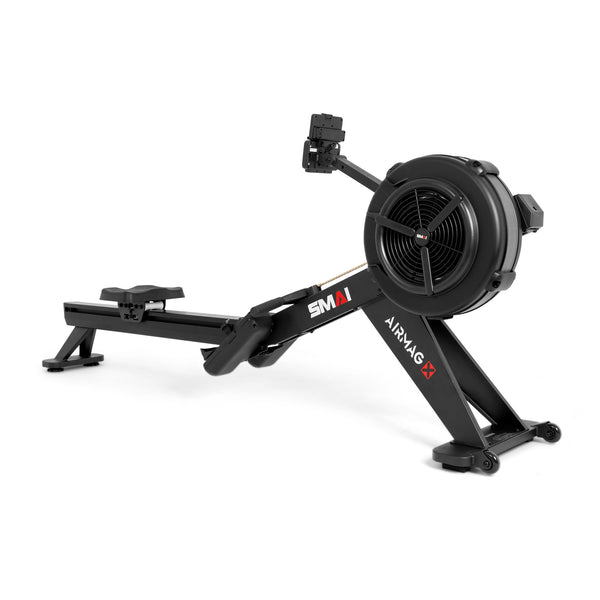 Black SMAI AirMag X rower with a flywheel, sliding seat, and a device holder on a white background, featuring hybrid air magnetic resistance.