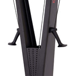 Close-up of an SMAI AirMag X Skier showing the vertical frame, two handles attached by cords, and a perforated metal guard.