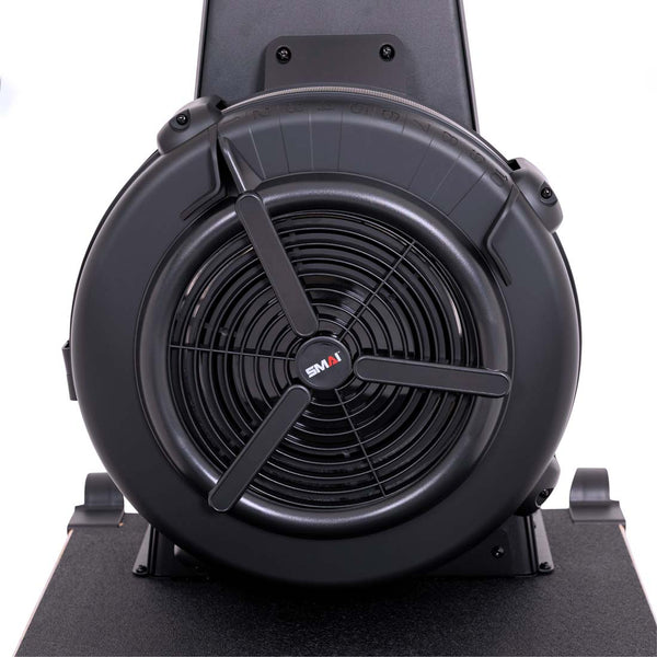 Black SMAI AirMag X Skier flywheel with an adjustable damper dial on top and a circular fan grill in the center.