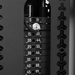 Close-up of the SMAI Functional Trainer’s dual weight stack, showing plates labeled in kg and lbs with the pin set at 11 kg (25 lbs). The black frame has geometric cutouts, making it a stylish choice for any home gym.