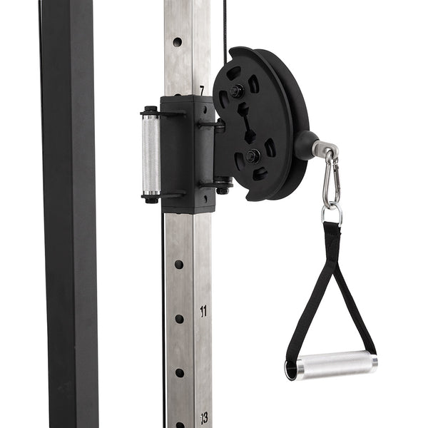 Close-up of the SMAI Functional Trainer’s cable adjustment mechanism, featuring a numbered metal upright, black rotating disc, carabiner, and handle—perfect for dual weight stack setups in any home gym.