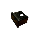 The SMAI Air Spin - Foot Cap is a black plastic, rectangular component with a circular opening and transparent compartment—perfect as a replacement part for your workspace, shown isolated on a white background.