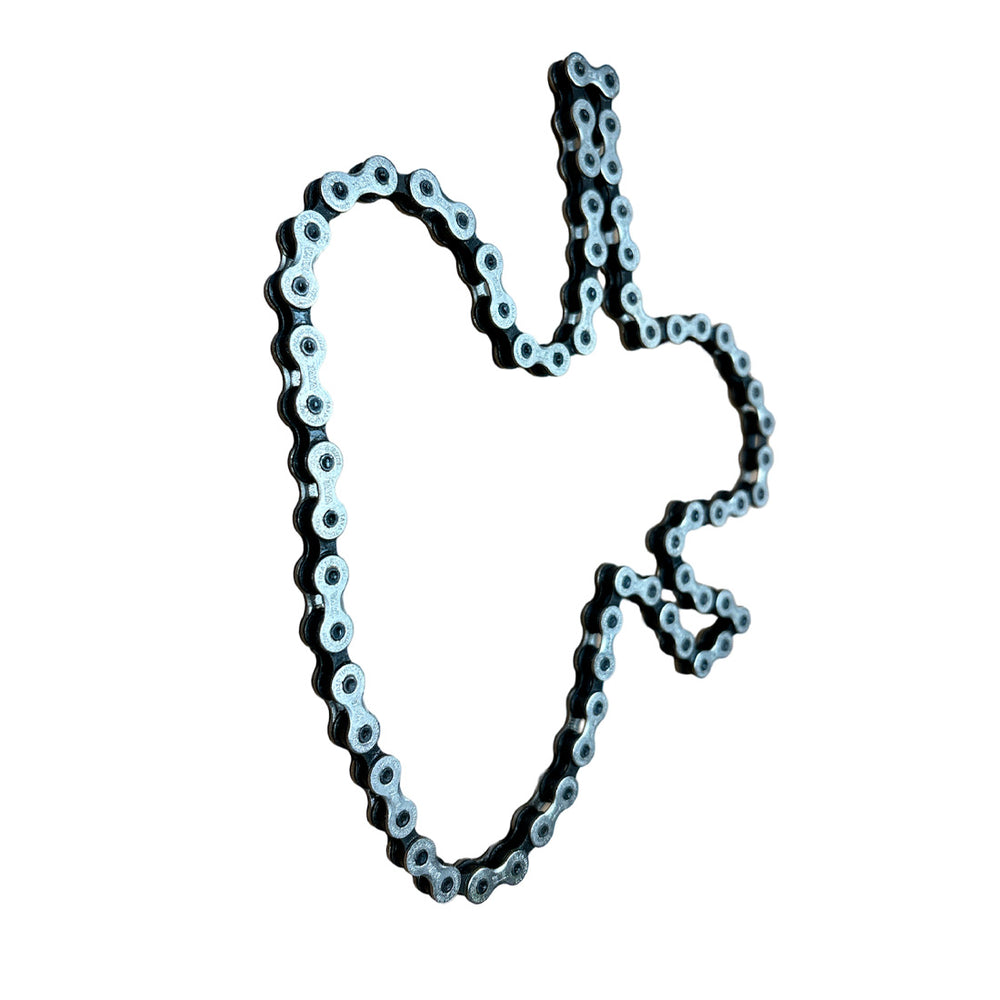 A SMAI Air Fit - Chain bicycle chain spare part shaped like Texas, displayed against a white background and inspired by the Air Fit Bike design.