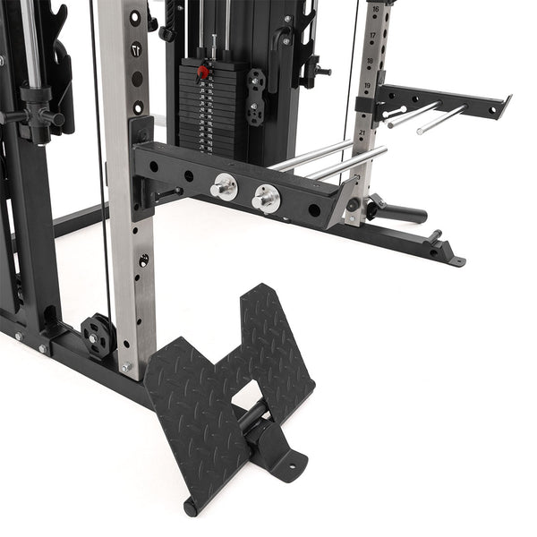 Close-up of the SMAI All in 1 Functional Trainer, featuring metal weight stacks, guide rods, adjustment knobs, and a diamond-plate angled footplate—engineered for commercial-grade performance on a white background.