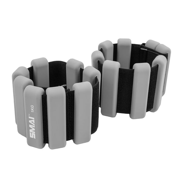 The SMAI Weighted Ankle / Wrist Bracelets 1KG (Pair) in grey feature black elastic straps and rectangular segments—perfect for resistance training.