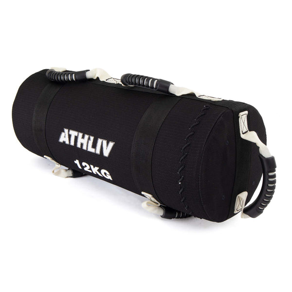 A black cylindrical ATHLIV Core Bag with "ATHLIV 12KG" in white text and six handles provides versatile grip options, making it a vital piece of commercial-grade fitness equipment.