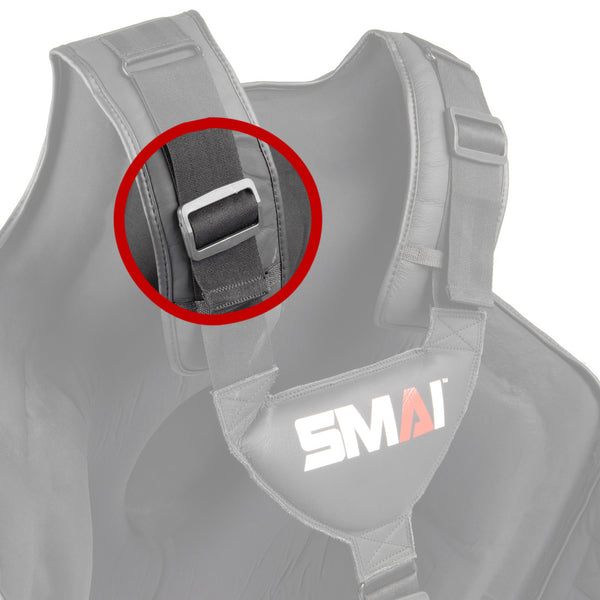 A close-up view highlights the black adjustable strap and silver buckle of the SMAI Boxers Chest Guard Replacement Part - Strap Adjuster. The secure strap adjuster clip is emphasized within a red circle, while the remainder of the padded vest is faded. The "SMAI" logo is visible on the product.
