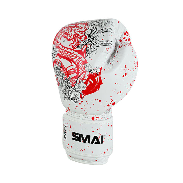 The SMAI Boxing Glove - White Dragon Limited Edition features premium cowhide leather in white with red splatter, an intricate red dragon design, and a wrist strap showing "SMAI" in black.