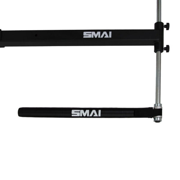 Two black, rectangular padded SMAI Boxing Bars attach to a vertical metal rod with adjustment knobs, forming an L-shape that likely enhances speed skill development in martial arts training.