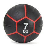 This medicine ball from the Sale Item Commercial Medicine Ball Set 24kg features a durable rubber shell with black and red accents, prominently displaying "7 KG," making it ideal for any high-quality fitness environment.