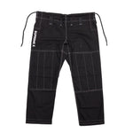 The SMAI Supreme X Brazilian Jiu Jitsu Uniform pants in black have reinforced stitching, an elastic waistband with drawstrings, belt loops, and "SUPREMEX" text printed vertically on the left hip. Shown laid flat on a white background.
