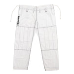 The Supreme X Brazilian Jiu Jitsu Uniform - White by SMAI features black stitching, knee reinforcement patches, belt loops, drawstring waist, and "SUPREMEX" printed vertically on the left thigh, all made from durable Rip Stop fabric.