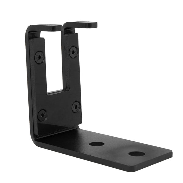 The SMAI X-Frame / Wall Mount Barbell Hanger features a black metal construction with a rectangular cutout and four screw holes. Its bent L-shape design makes it ideal for securely mounting or supporting items, such as serving as a barbell hanger in your home gym's squat rack setup or for shelving and equipment installation.