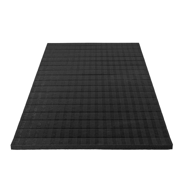 The SMAI Roll Out Workout Mat - Dollamur Flexi Roll in black features a rectangular shape, subtle grid pattern, and tatami-textured vinyl, displayed on a white background.