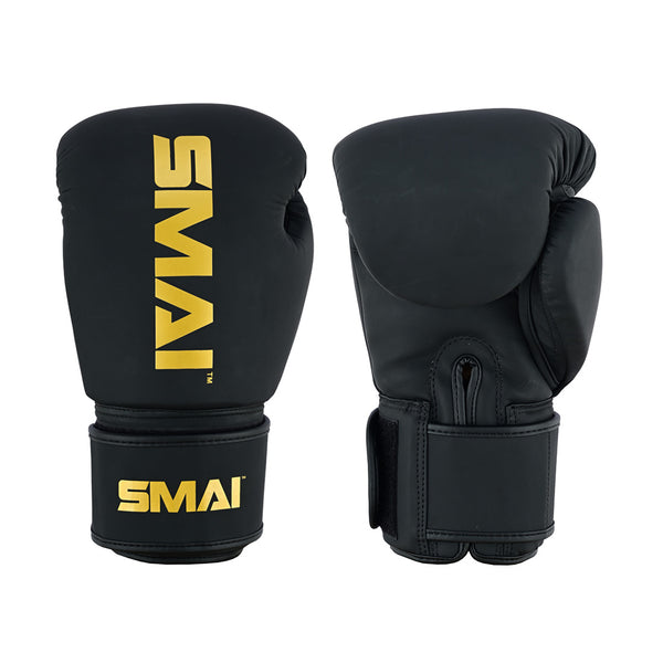 The PRE ORDER - Gold Series Boxing Glove - Black/Gold by SMAI features gold branding, a velcro wrist strap, and a smooth padded surface—ideal for those seeking premium boxing gloves. Shown from both front and back.