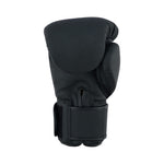 A single SMAI PRE ORDER - Gold Series Boxing Glove - Black/Gold with a velcro strap, shown upright on a plain white background—premium gloves by SMAI for superior performance and durability.