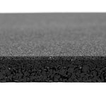 Close-up of the SMAI Rubber Course Granule Gym Flooring Tile - 15mm in black, showing its smooth top and coarse granule cross-section. The tile’s anti-slip surface is displayed clearly against a plain white background.