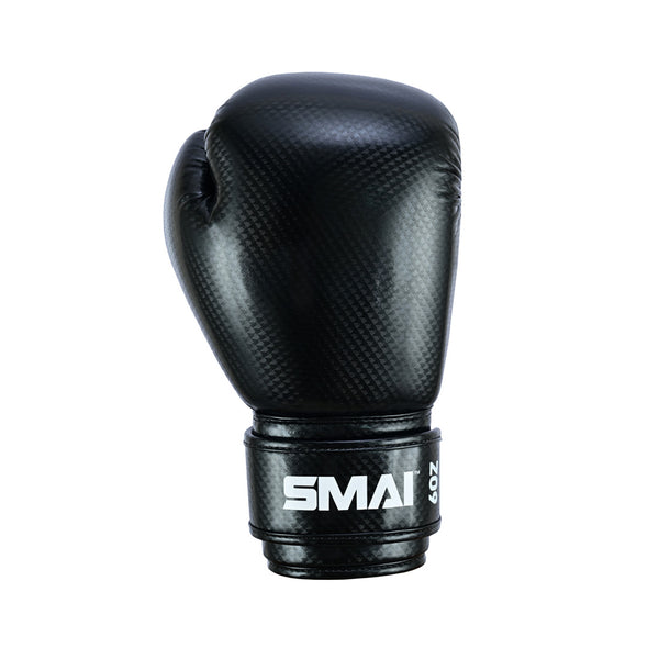 The PRE ORDER: Essentials Kids Boxing Glove - Black by SMAI features a textured design and a wrist strap labeled "SMAI" and "6oz" in white, shown upright against a plain white background.