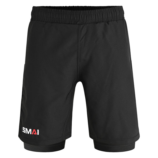 The SMAI Hybrid MMA Grappling Shorts in black feature an elastic waistband, subtle double-layer design, and “SMAI” printed in white and red on the lower left leg. These plain fight shorts have no visible pockets or patterns.