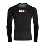 The SMAI Long Sleeve Rash Guard - Black is a fitted MMA compression shirt with “SMAI” printed in white and red on the chest, no patterns or graphics, ideal for no-gi grappling.