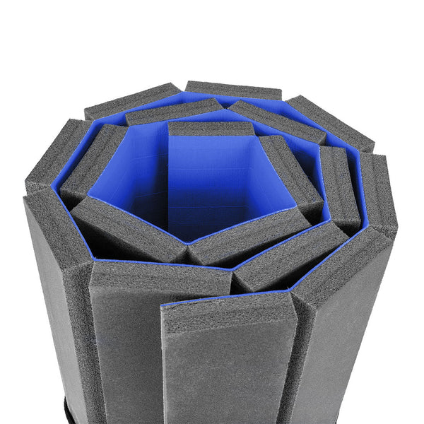 Close-up of Dollamur Flexi Connect Gym Flooring Roll by SMAI in royal blue, rolled into a spiral with black and blue layers, featuring athletic foam technology for a striking, modern geometric look.