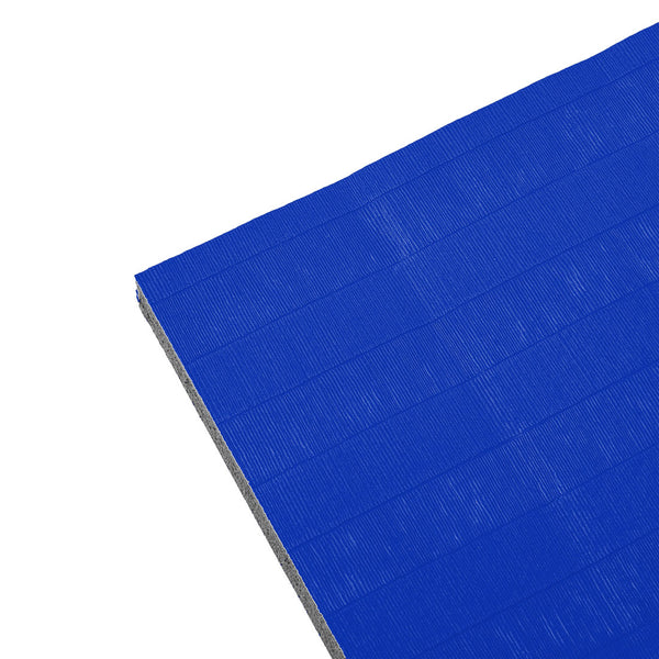 A close-up of the SMAI Dollamur Flexi Connect Gym Flooring Roll in royal blue, featuring a textured surface and athletic foam cushioning, displayed at an angle on a white background.