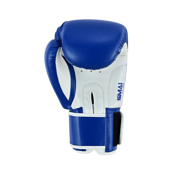 The Essentials Boxing Glove - Blue by SMAI features blue and white colors, a black Velcro strap, and "SMAI" branding on the white area—perfect for sparring sessions.