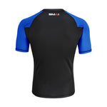The SMAI Short Sleeve Rash Guard - Blue is a black and blue compression shirt shown from the back, ideal for BJJ, with the SMAI logo at the upper center near the neckline.