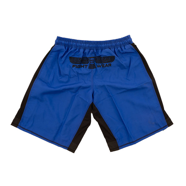 SMAI MMA Shorts Heavy Duty in blue with black side panels, shown flat with the back up. Features a black winged emblem and "FIGHT WEAR" print on the upper back.