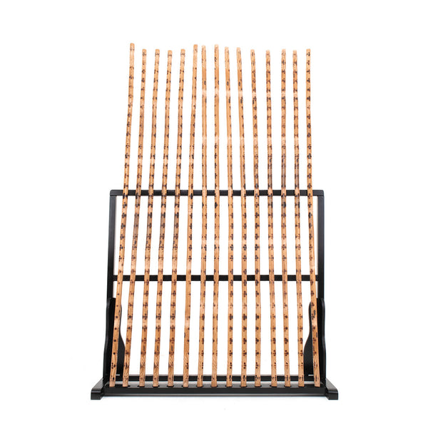 View of bo staffs stored on wooden rack