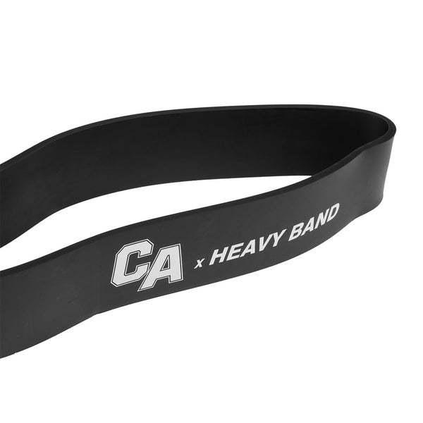 The SMAI Combine Air 75lb Rubber Resistance Band, featuring a matte black finish with "CA x HEAVY BAND" in white, is designed for strength training with enhanced grip ideal for workouts.