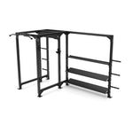 The Power Rack with Storage Wing from the Vanta Series by SMAI is a black metal rack designed for weightlifting and fitness training, featuring multiple horizontal and vertical bars. It includes adjustable components for various exercises and offers shelving on one side for convenient storage.