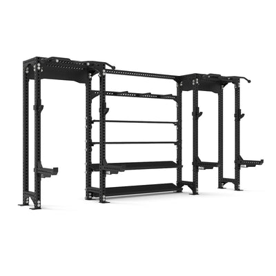 The SMAI 2 Half Rack Cells with Storage from the Vanta Series is a black, heavy-duty steel gym rack featuring multiple adjustable slots and hooks for workout equipment. Designed for exercises like squats, bench presses, and pull-ups, this power rack boasts a sturdy, industrial appearance.