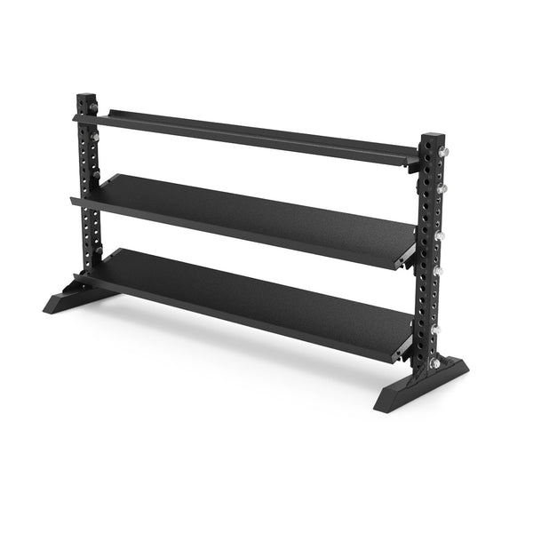The 1.1m Storage Shelf from the SMAI Vanta Series is a black, three-tier rack featuring durable metal construction and angled shelves for easy access. It boasts a stable, wide base support and adjustable bolted joints, and it arrives empty, prepared for setup in a gym environment.