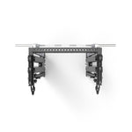 The Functional Trainer Dual Cable Stacks & Smith Machine from the SMAI Vanta Series presents a symmetrical mechanical structure that resembles a compact rack. It showcases two black, ladder-like arms suspended horizontally and includes metal rods and perforated plates, making it suitable for industrial or robotic applications. The product is set against a white background.