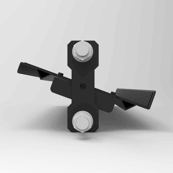 Crafted by SMAI, the Dumbbell Shelf - 108cm from the Vanta Series features black metal hardware with two angled plates connected by a vertical bar, secured with large bolts at both the top and bottom. Designed for efficient dumbbell storage as part of an angled dumbbell shelf system—ideal for use with the Vanta Series power rack—it is pictured against a plain gray background.