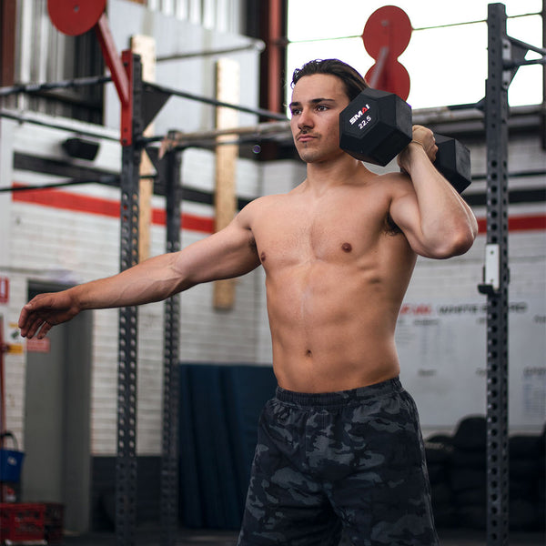 Man using SMAI Apex Dumbbell Set 