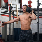 Man using the SMAI Apex Dumbbell Set
