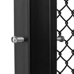 Close-up of an SMAI MMA Cage Wall - Single Panel attached to a black metal post. The post features a threaded bolt secured with nuts, maintaining the panel in place. The diamond-shaped pattern of the wall is clearly visible.