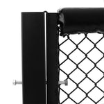 Close-up of the SMAI MMA Cage Wall - Single Panel, which is a black metal chain-link panel with a padded edge, similar to an MMA cage wall. The panel is secured with a bolt on the left side, and there is a curved section of padding visible at the top right.