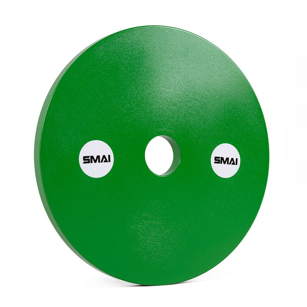 A pair of green, round SMAI Calibrated Weight Plates (10kg each) with a central hole and white "SMAI" stickers on either side, shown standing upright against a white background.