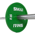 A pair of SMAI Calibrated Weight Plates - 10kg are shown with their green plates mounted on a silver barbell against a white background.