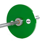 A close-up of a silver barbell with a large green SMAI Calibrated Weight Plate - 10kg (Pair), isolated on a white background.