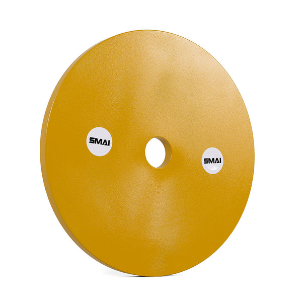 A single yellow 15kg SMAI Calibrated Weight Plate with a central hole and two white "SMAI" stickers on its surface, shown on a plain white background.