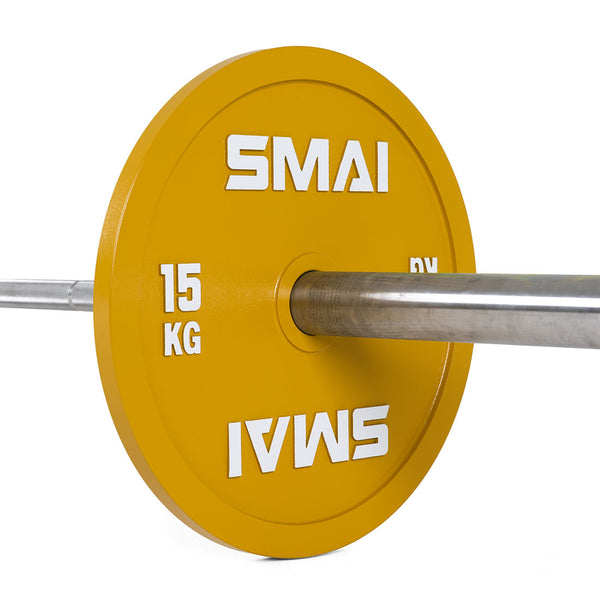 A pair of yellow SMAI Calibrated Weight Plates - 15kg is mounted on a metal barbell, isolated against a white background.
