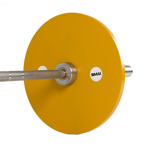 A close-up of the SMAI Calibrated Weight Plates - 15kg (Pair) on a barbell, shown on a white background with the metal bar extending from the center.