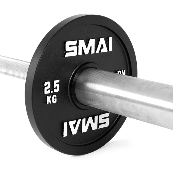 A close-up of a SMAI Calibrated Weight Plate - 2.5kg shows the black cast iron plate with "SMAI" and "2.5 KG" in white text, fitted on a metal barbell, highlighting both the branded plate and part of the bar.