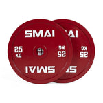 A pair of SMAI Calibrated Weight Plates, each 25kg, are shown overlapping on a white background. The red plates feature "SMAI" and "25 KG" in white text.